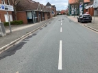 Schäden in der Fahrbahndecke der Straße Achterrut